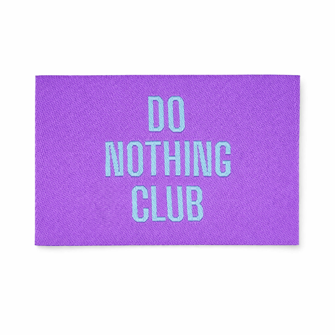 Hovedbilde Do Nothing Club - Lilla - Merkelapp 57x38 mm